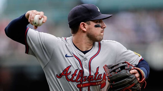 Aug 11, 2024; Denver, Colorado, USA; Atlanta Braves third baseman Austin Riley (27) throws to first for an out in the fifth inning against the Colorado Rockies at Coors Field. Mandatory Credit: Isaiah J. Downing-Imagn Images