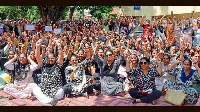Anganwadi workers union protesting against the government at DPO office in Ludhiana on Thursday. (Manish/HT)