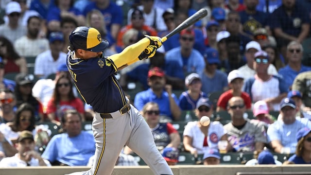 Aug 18, 2025; Chicago, Illinois, USA; Milwaukee Brewers shortstop Joey Ortiz (3) hits an RBI single during the sixth inning against th Chicago Cubs at Wrigley Field. Mandatory Credit: Matt Marton-Imagn Images