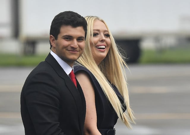 (L-R)  Michael Boulos and Tiffany Trump wait for the arrival of US President Donald Trump and First Lady Melania Trump at Orlando International Airport in Orlando, Florida, on June 18, 2019. – Trump kicks off his reelection campaign at what promised to be a rollicking Tuesday evening rally in Orlando. (Photo by MANDEL NGAN / AFP) (Photo by MANDEL NGAN/AFP via Getty Images)