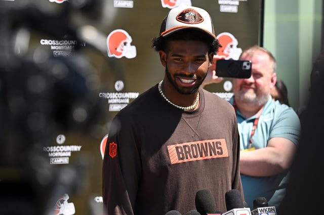 Shedeur Sanders #12 of the Cleveland Browns answers questions from the media during a press conference prior to rookie minicamp at CrossCountry Mortgage Campus on May 10, 2025 in Berea, Ohio.