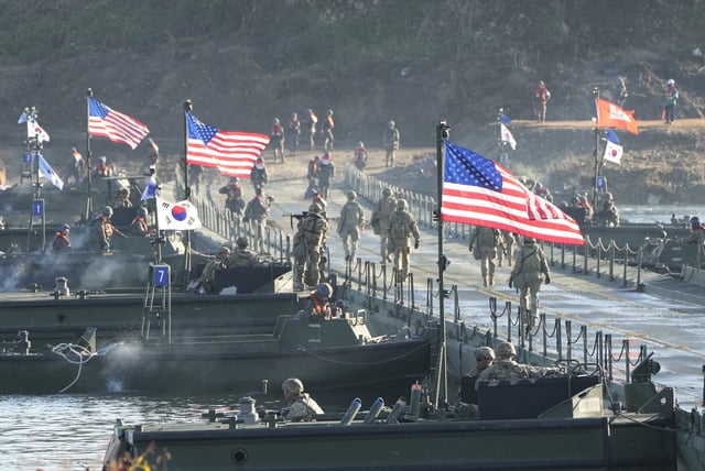 FILE - Flags of South Korea and the United States flutter before a joint river-crossing drill between South Korea and the United States in Yeoju, South Korea, Friday, Oct. 20, 2023. (AP Photo/Ahn Young-joon, File)