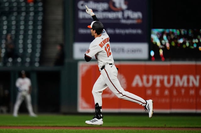 Baltimore Orioles’ Dylan Beavers (12) rounds the bases after hitting a home run during the second inning of a baseball game against the Houston Astros, Thursday, Aug. 21, 2025, in Baltimore. (AP Photo/Stephanie Scarbrough)