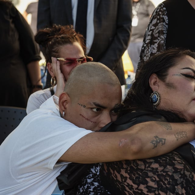 Holly Roy, mother of Jahvai Roy, is consoled during a candlelight vigil in honour of her son who was murdered by a stray bullet in their home in North York, ON on August 21st 2025. Duane Cole/The Globe and Mail