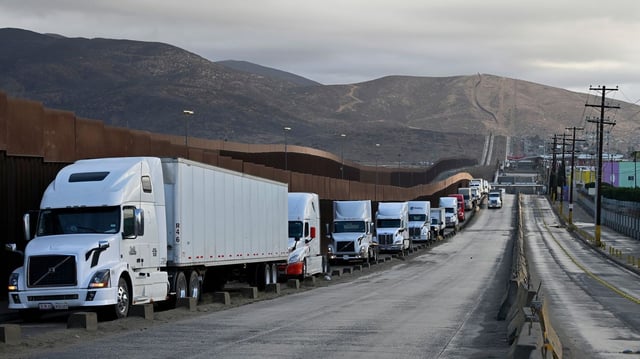Trucks lined up at the U.S.-Mexico border in Jan. 2025. Photo: Carlos Moreno/Bloomberg via Getty Images
