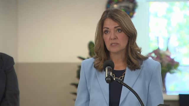 Premier Danielle Smith defended her government's COVID-19 policy at a news conference in Calgary on Thursday. 