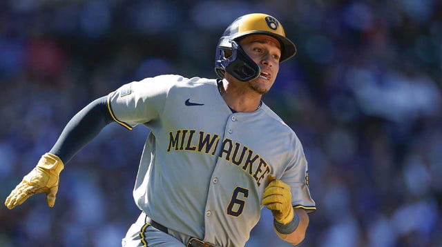 Aug 21, 2025; Chicago, Illinois, USA; Milwaukee Brewers left fielder Isaac Collins (6) runs after hitting a two-run single against the Chicago Cubs during the eight inning at Wrigley Field. Mandatory Credit: Kamil Krzaczynski-Imagn Images