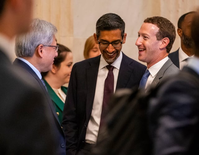 Sept. 13, 2023; Washington, D.C., USA; Mark Zuckerberg, Meta - CEO, right, speaking with Sundar Pichai, Google - CEO, center, and Jensen Huang, NVIDIA - CEO, left, at the start of Senate Majority Leader Chuck Schumer, Senators Rounds, Heinrich And Young hosting the Inaugural Artificial Intelligence Insight Forum With Key AI Stakeholders To Help Forge Bipartisan Consensus On Legislation To Capitalize On This Transformative Technology. Mandatory Credit: picture-alliance/Jack Gruber-USA TODAY