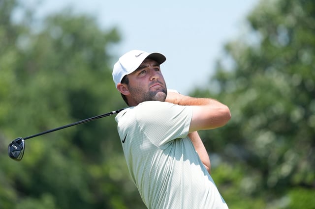 FILE - Scottie Scheffler hits a tee shot on the third hole during the final round of the Charles Schwab Challenge golf tournament at Colonial Country Club in Fort Worth, Texas, Sunday, May 26, 2024. The Masters champion has been the No. 1 player in the world for more than a year. Scheffler is so far ahead of the rest of golf that his margin atop the world ranking is the largest since the peak years of Tiger Woods. (AP Photo/LM Otero, File)