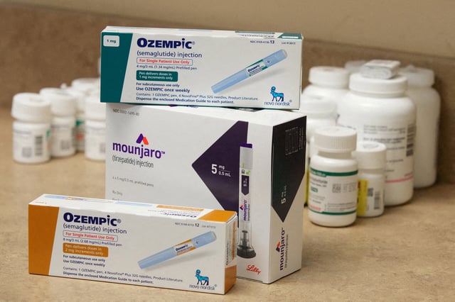 Boxes of Ozempic and Mounjaro, semaglutide and tirzepatide injection drugs used for treating type 2 diabetes and made by Novo Nordisk and Lilly, is seen at a Rock Canyon Pharmacy in Provo, Utah, U.S. March 29, 2023. REUTERS/George Frey/File Photo