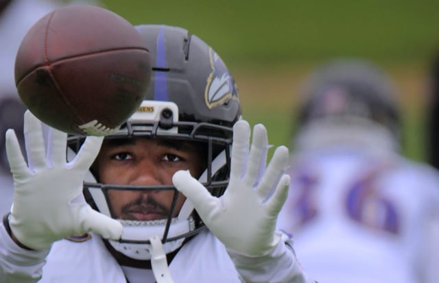 Baltimore Ravens cornerback Keyon Martin catches the ball during practice at Baltimore’s training facility, for the upcoming NFL preseason game hosted by the Washington Commanders. (Karl Merton Ferron/Staff)