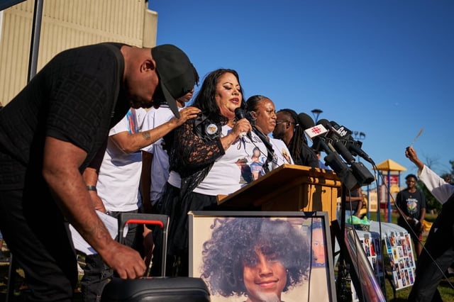 Holly Roy, the mother of Jahvai Roy, speaks at a vigil in Toronto, on Thursday, Aug. 21, 2025. 8-year-old Jahvai Roy was struck and killed by a stray bullet over the weekend. THE CANADIAN PRESS/Sammy Kogan