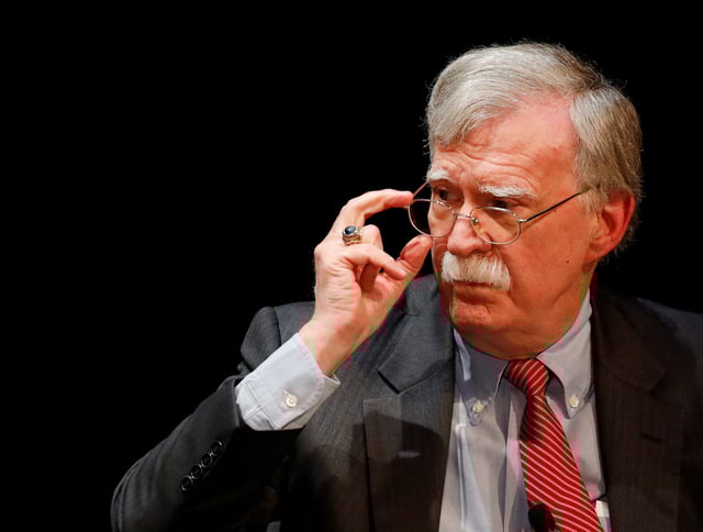 Former U.S. national security advisor John Bolton adjusts his glasses during his lecture at Duke University in Durham, North Carolina, on Feb. 17, 2020.