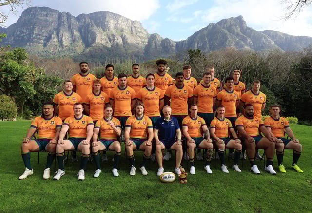 Rugby Union - Rugby Championship - Australia Team Photo - The Vineyard, Cape Town, South Africa - August 22, 2025  Australia head coach Joe Schmidt poses for a team photo with the players REUTERS/Esa Alexander