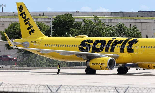 A Spirit Airlines plane parked at Fort Lauderdale - Hollywood International Airport on Friday, October 20, 2023.  (Carline Jean/South Florida Sun Sentinel)