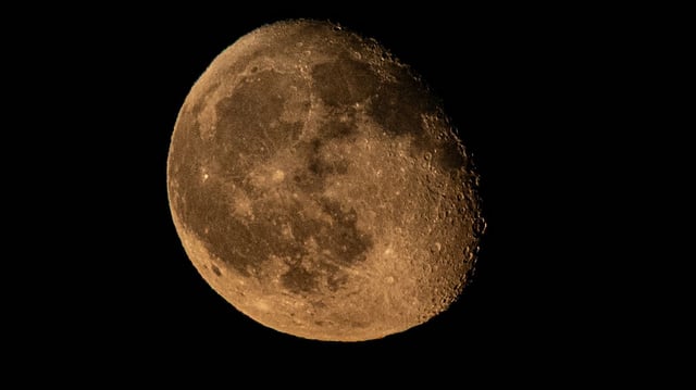 The moon pictured was seen over Karaman, Turkiye, on August 14, 2025. It is not a black moon (Photo by Ömer Tarsuslu/Anadolu via Getty Images)