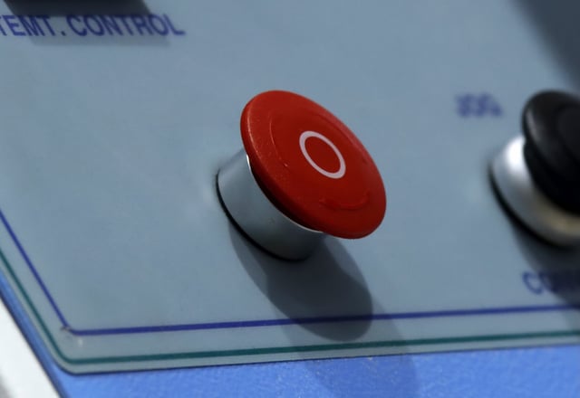 Red emergency button and stop at factory