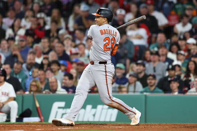 Aug 18, 2025; Boston, Massachusetts, USA; Baltimore Orioles catcher Samuel Basallo (29) hits a two run RBI single during the ninth inning against the Boston Red Sox at Fenway Park. Mandatory Credit: Paul Rutherford-Imagn Images/File Photo