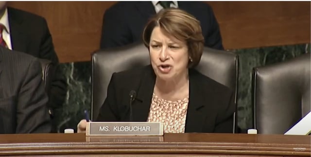 Sen. Amy Klobuchar, D-Minn., speaks sarcastically at a Senate committee hearing.