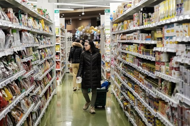 A customer shops at T&T Supermarket's location in Toronto's Fairview Mall, Friday, Nov. 28, 2024. THE CANADIAN PRESS/Chris Young
