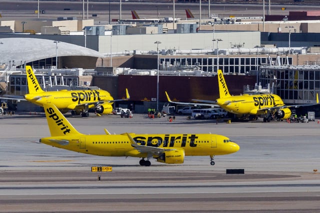 Spirit Airlines commercial airliners are shown at Las Vegas International Airport in Las Vegas, Nevada, U.S., February 8, 2024.  REUTERS/Mike Blake/File Photo