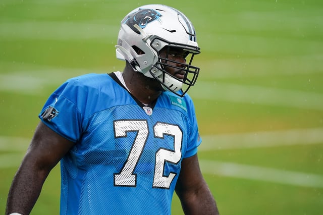 Aug 21, 2020; Charlotte, North Carolina, USA; Carolina Panthers offensive tackle Taylor Moton (72) looks on during training camp held at the Panthers training facility.  Mandatory Credit: Jim Dedmon-USA TODAY Sports/File Photo