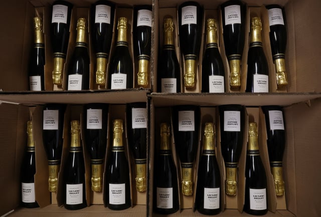 Champagne boxes are prepared for shippment at Leclerc Briant Champagne house, in Epernay, France, August 22, 2025. REUTERS/Christian Hartmann