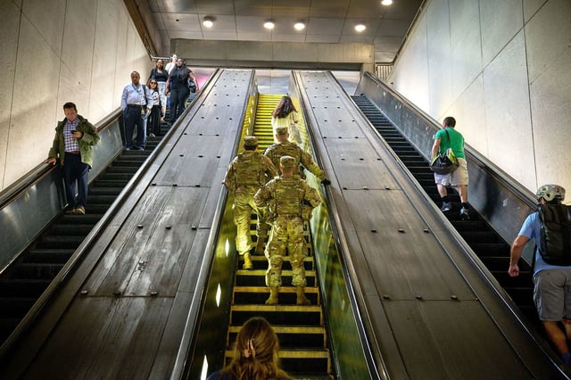 Members of the National Guard patrol a Metro station in Washington DC on August 20, 2025.