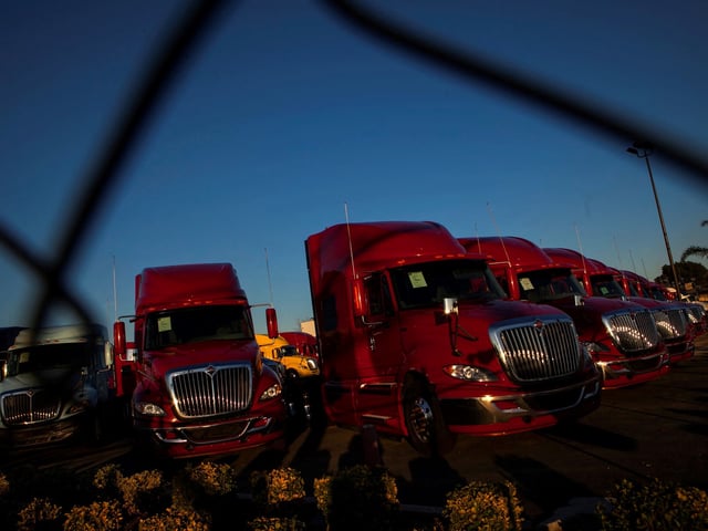 FILE PHOTO: Trucks are seen in Fontana, California December 20, 2013. REUTERS/Eric Thayer/File Photo