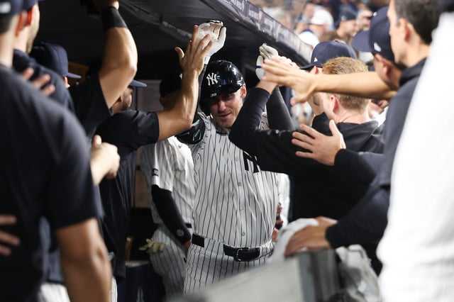 NEW YORK, NY - AUGUST 13: Cody Bellinger #35 of the New York Yankees celebrates with teammates after hitting a solo home run during the game against the Minnesota Twins at Yankee Stadium on August 13, 2025 in New York, New York. (Photo by New York Yankees/Getty Images)