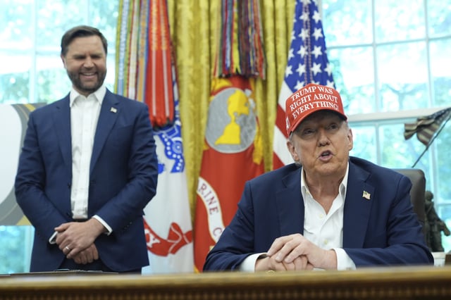 President Donald Trump speaks as Vice President JD Vance listens in the Oval Office of the White House, Friday, Aug. 22, 2025, in Washington.