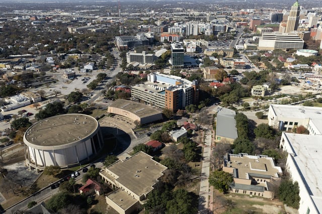 The drum-shaped John H. Wood, Jr. Federal Courthouse and curved Adrian A. Spears Judicial Training Center, left, are seen in Hemisfair Park on Tuesday, Jan. 7, 2025 in San Antonio, Texas.