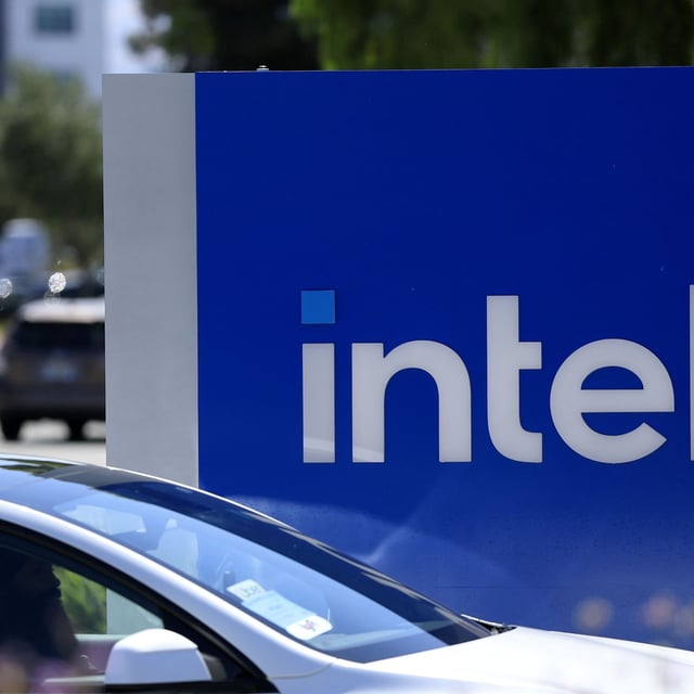 The Intel logo is displayed on a sign in front of Intel headquarters on July 16, 2025 in Santa Clara, California.