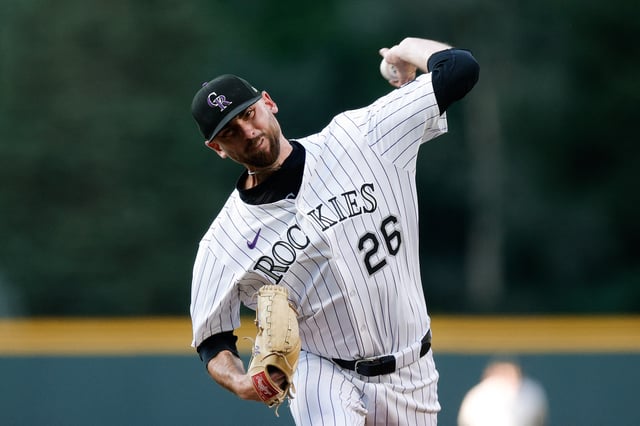 Aug 19, 2025; Denver, Colorado, USA; Colorado Rockies starting pitcher Austin Gomber (26) pitches in the first inning against the Los Angeles Dodgers at Coors Field. Mandatory Credit: Isaiah J. Downing-Imagn Images/ File Photo