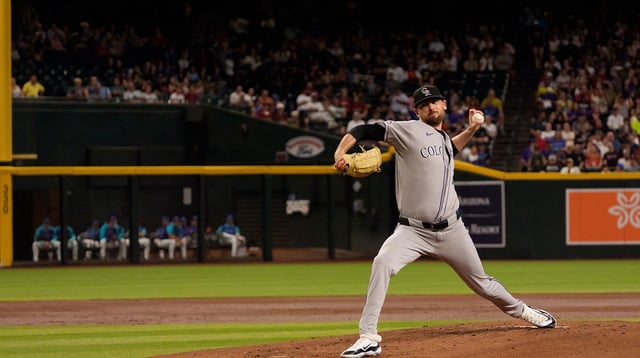 Aug 8, 2025; Phoenix, Arizona, USA; Colorado Rockies pitcher Austin Gomber (26) pitches in the first inning against the Arizona Diamondbacks at Chase Field. Mandatory Credit: Allan Henry-Imagn Images