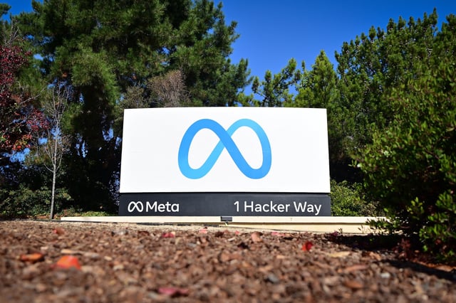 The Meta logo marks the entrance of its corporate headquarters in Menlo Park, Calif., on Nov. 9, 2022. Facebook owner Meta plans to lay off more than 11,000 of its staff in “the most difficult changes we’ve made in Meta’s history,” CEO Mark Zuckerberg said on Aug. 20, 2025.