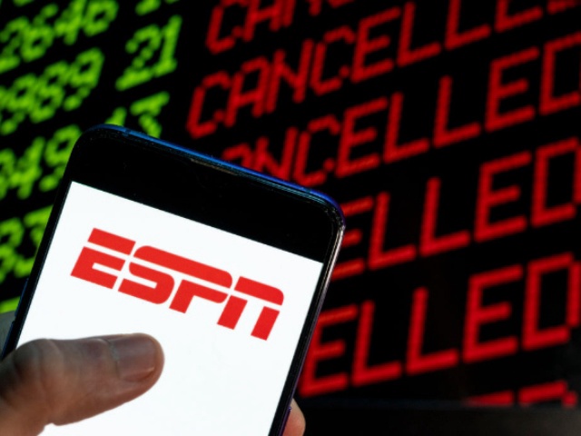 CHINA - 2021/04/24: In this photo illustration the American sports television channel ESPN logo is seen on an Android mobile device with the word cancelled on a computer screen. (Photo Illustration by Budrul Chukrut/SOPA Images/LightRocket via Getty Images)