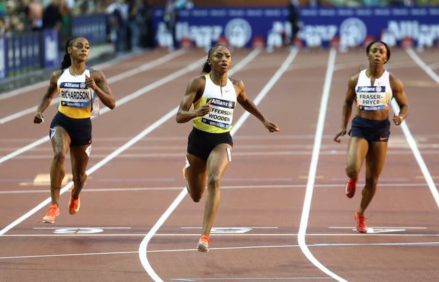 Athletics - Diamond League - Brussels - King Baudouin Stadium, Brussels, Belgium - August 22, 2025  Melissa Jefferson-Wooden of the U.S. wins the women's 100m final ahead of second placed Sha'Carri Richardson of the U.S. and fourth placed Jamaica's Shelly-Ann Fraser-Pryce REUTERS/Yves Herman