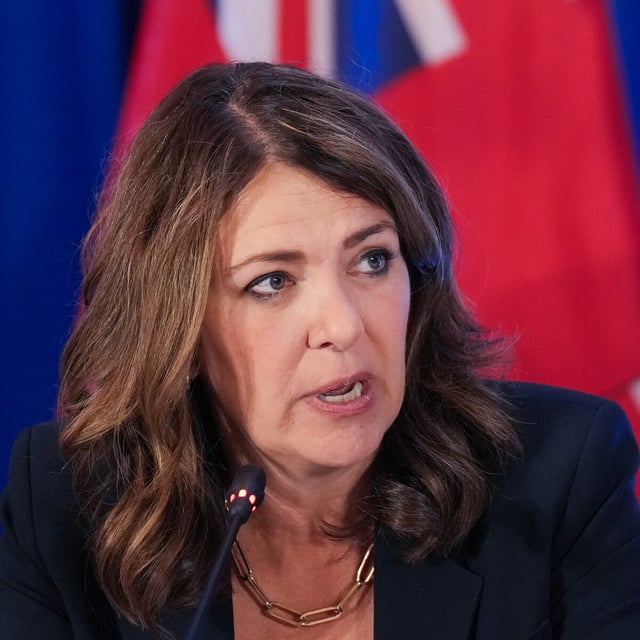 Alberta Premier Danielle Smith answers a question from the media during the meeting of Canada’s premiers in Huntsville, Ont., on Wednesday, July 23, 2025. THE CANADIAN PRESS/Nathan Denette