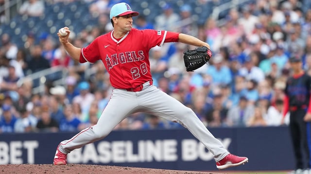 Jul 4, 2025; Toronto, Ontario, CAN; Los Angeles Angels starting pitcher Kyle Hendricks (28) throws a pitch against the Toronto Blue Jays during the first inning at Rogers Centre. Mandatory Credit: Nick Turchiaro-Imagn Images