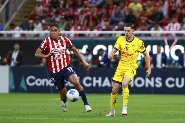 Luis Romo (L) of Guadalajara fights for the ball with Alvaro Fidalgo (R) go America during the round of 16 first leg match between Guadalajara and America as part of the CONCACAF Champions Cup 2025, at Akron Stadium on March 05, 2025 in Guadalajara, Jalisco, Mexico.