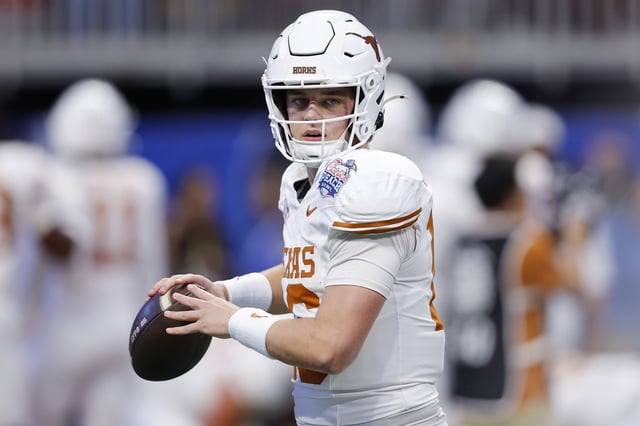 Arch Manning #16 of the Texas Longhorns warms up prior to the Chick-fil-A Peach Bowl against the Arizona State Sun Devils at Mercedes-Benz Stadium on January 01, 2025 in Atlanta, Georgia.