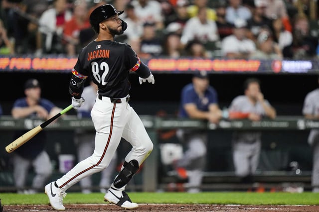 Baltimore Orioles' Jeremiah Jackson watches as he hits a two-run RBI double during the fourth inning of a baseball game against the Houston Astros, Friday, Aug. 22, 2025, in Baltimore.
