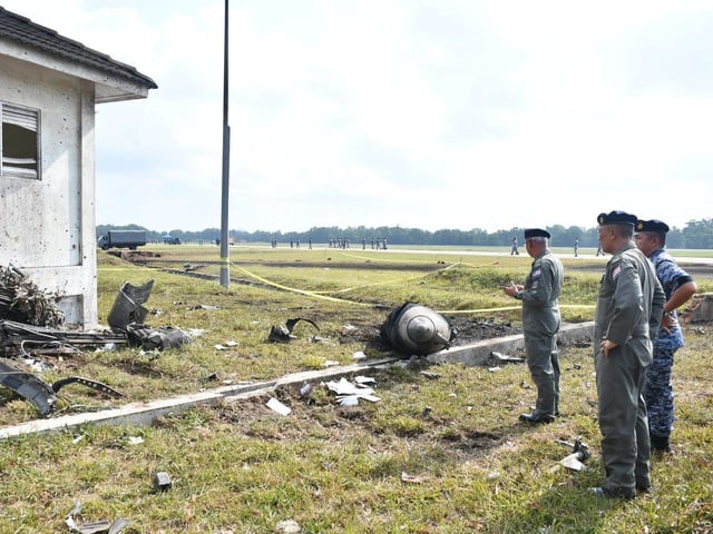 Debris from the F/A-18 can be seen after the crash.