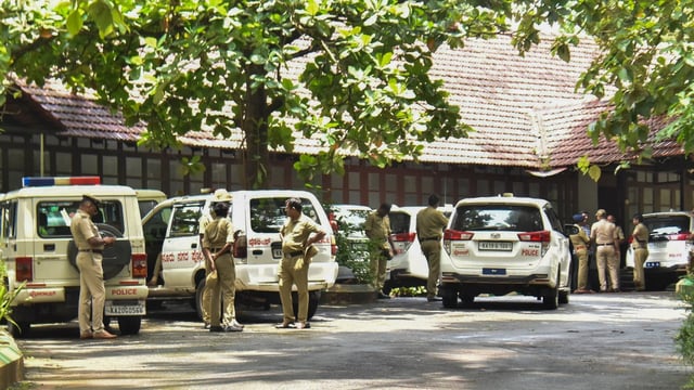 Police personnel at the office of the SIT constituted to probe the case related to the alleged mass burial in Dharmasthala of Dakshina Kannada district, in Mangaluru,