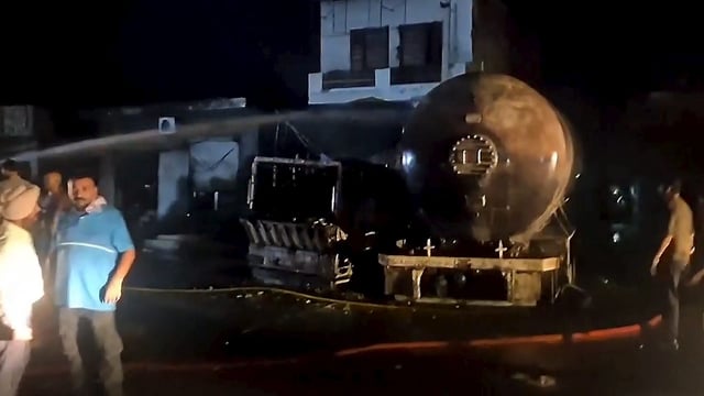 Fire personnel doused a fire in an LPG tanker late Friday on the Hoshiarpur-Jalandhar road in Hoshiarpur, Punjab.