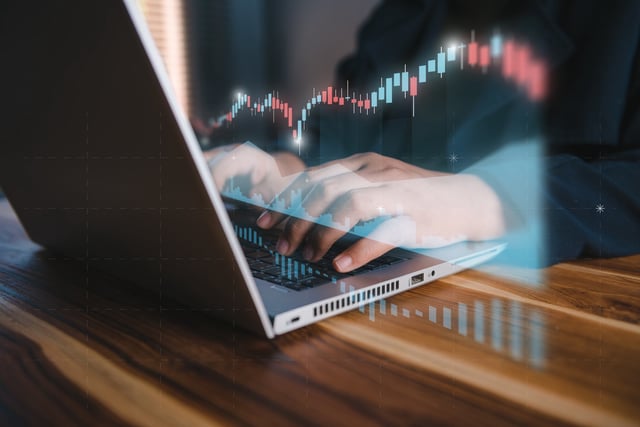 Stock Trade and Money Exchange Online Market Concept. Businesswoman is Stock Trading Analysis on Laptop With Screen Chart Diagram. Strategy Business Investment Trading Online and Financial Plan