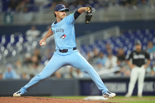 Aug 22, 2025; Miami, Florida, USA; Toronto Blue Jays starting pitcher Shane Bieber (57) throws a pitch against the Miami Marlins at loanDepot Park. Mandatory Credit: Jim Rassol-Imagn Images