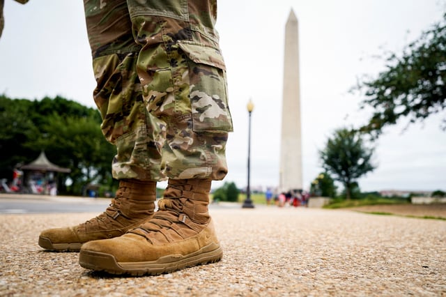 A members of the Mississippi National Guard stands near the Washington Monument on the National Mall after U.S. President Donald Trump deployed the National Guard and ordered an increased presence of federal law enforcement to assist in crime prevention, in Washington, D.C., U.S., August 21, 2025. REUTERS/Al Drago