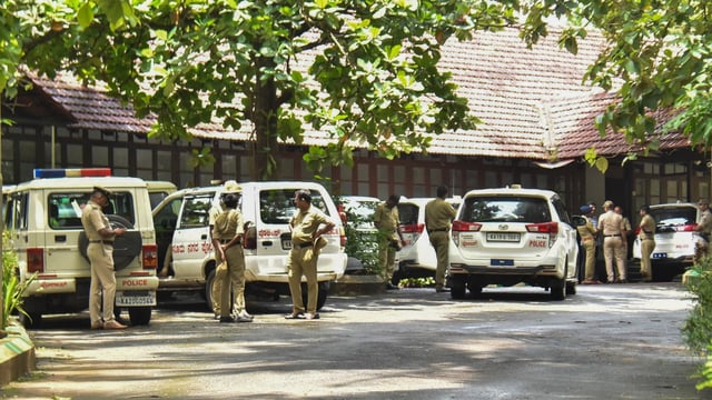 Police personnel at the office of the SIT constituted to probe the case related to the alleged mass burial in Dharmasthala of Dakshina Kannada district.